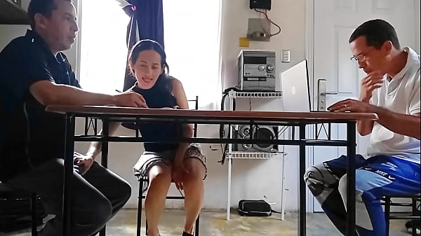 While the cuckold does the math, his cheating wife drains the contractor's cum under the table.