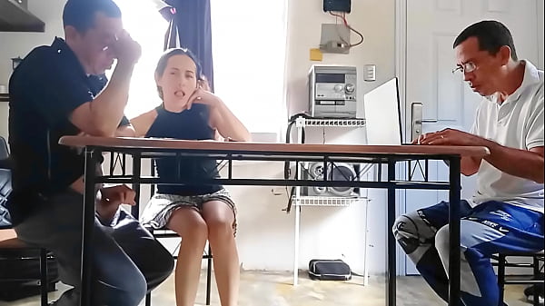 While the cuckold does the math, his cheating wife drains the contractor's cum under the table.