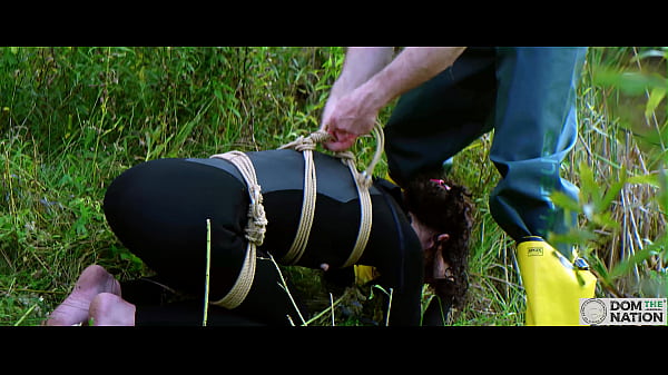 Submissive painslut softened up for painal punishment with some dunks in the pond - Lydia Black and Charlotte Sartre in a real outdoor BDSM sex documentary filmed in Wisconsin