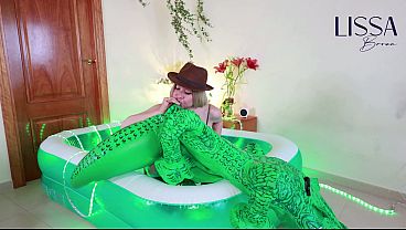 Lissa Brown&comma; safari explorer&comma; inflating an inflatable croc