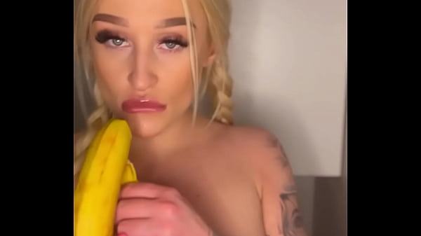 Horny college girl sucks on a banana