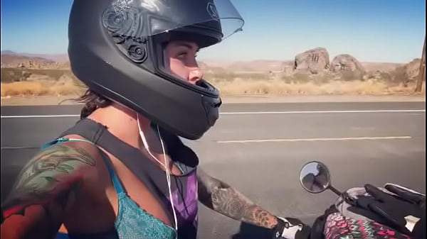 felicity feline motorcycle babe riding aprilia in bra