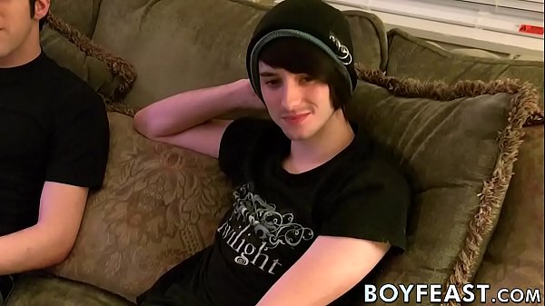 Young men kiss before performing sloppy oral an...