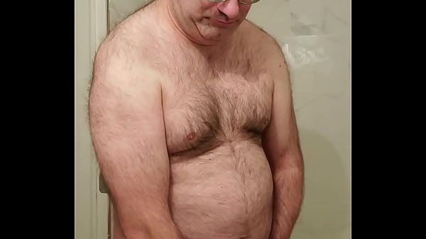 Nude Martin Lavallée mastubates, ejaculates and...