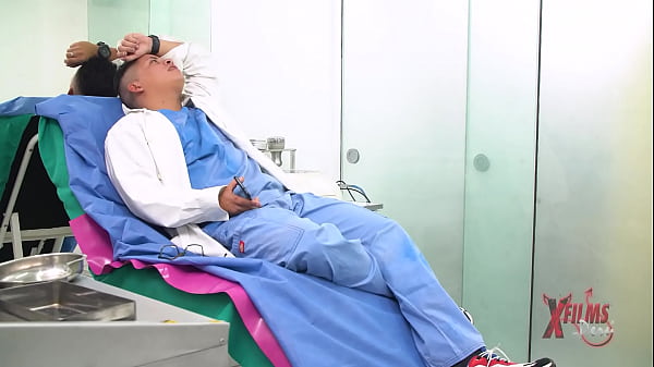 Redhead MILF goes to the gynecologist, and he performs a Pap smear with his tongue