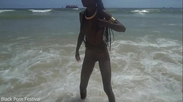 At the beach with a skinny tribe slut