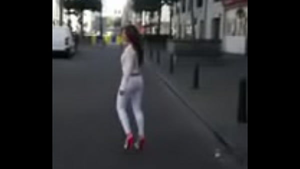 7321620 hooker walking in the street in sexy high heels and legging