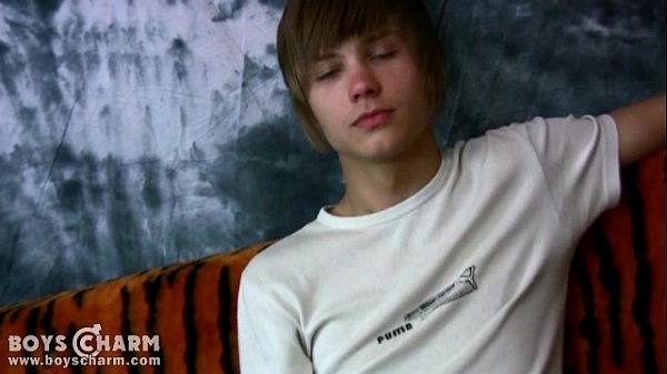 Download Video - Adorable twink provokingly pushes down his pants