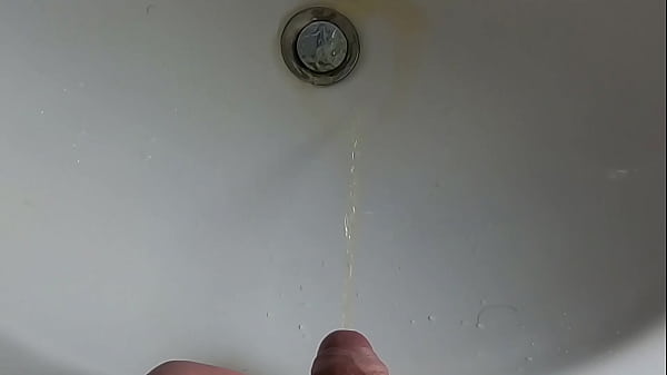 Boy is Pissing in the Sink and makes stinky farts