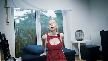 Blonde model with amazing tits in a red dress