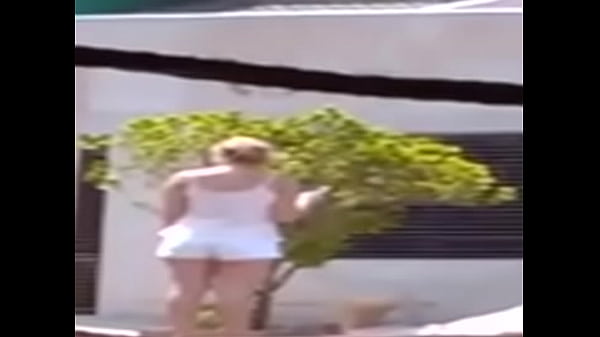 blonde girl in white tight shorts