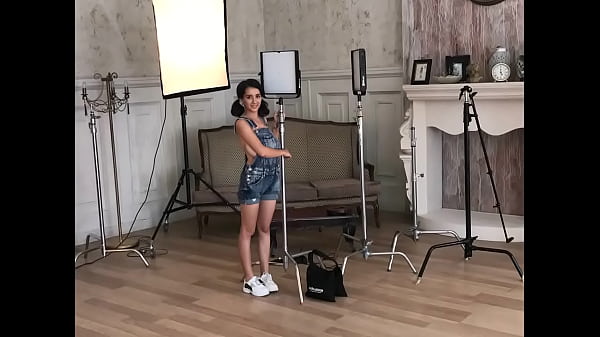 Hot busty brunette's photo session