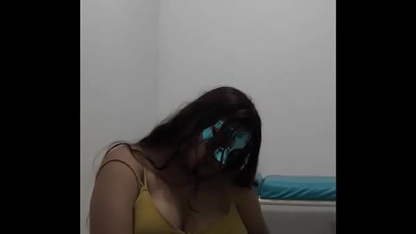 Brunette student takes the questionnaire before going to exams. She touches her breasts in a sexy way.
