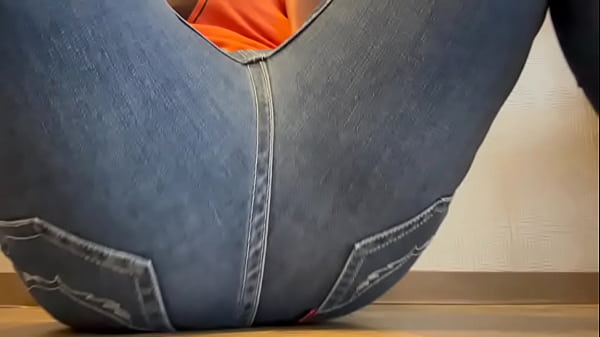 With my jeans half on, I stuck a transparent dildo into my pussy and masturbated hard, cumming...