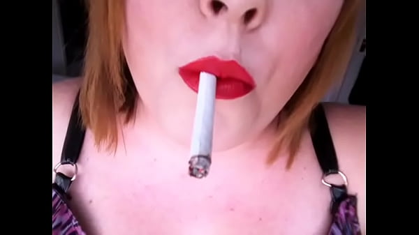 BBW Mistress Tina Snua Smoking A Filterless Cigarette In A PVC Top