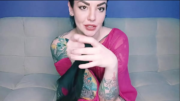 Tattooed hottie with a big ass takes her panties in her mouth and slaps her fucking ass