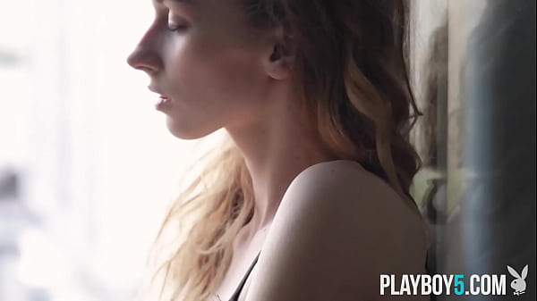 Petite blonde MILF model from the Ukraine Yana West solo softcore