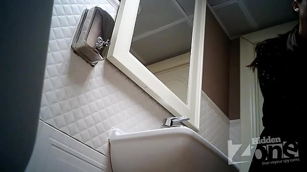 Hidden camera in the toilet of a bar.