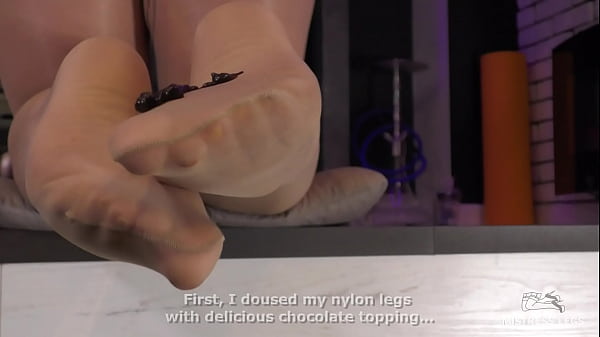 Mistress Leg washing nylon feet from the chocolate topping