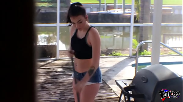 Horny teen cleans back pool patio and strokes her black cock friend