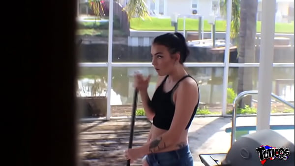 Horny teen cleans back pool patio and strokes her black cock friend