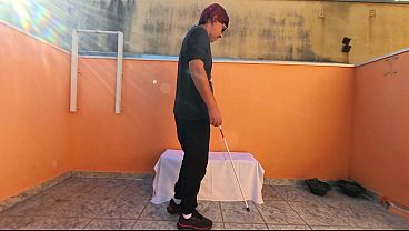 Blind man has a lucky day while resting in a public place.