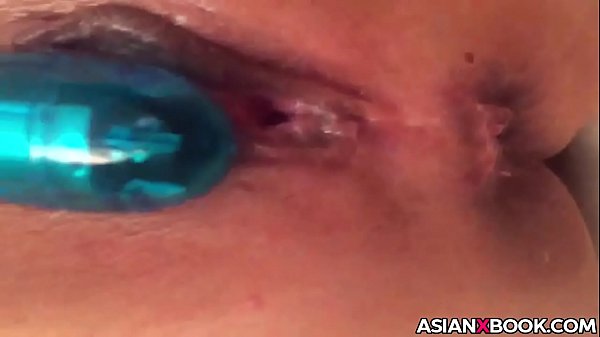 Asian babe gets her pussy toyed