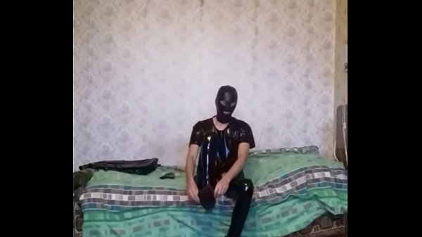 Download Video - Guy in PVC suit