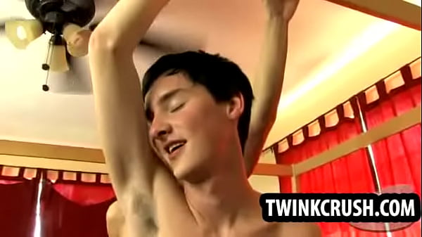 Horny twink tugging on his cock while getting f...