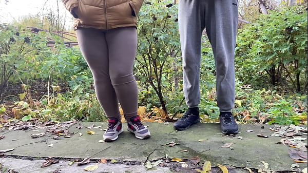Depraved curvy MILF in leggings squats down and pisses next to me