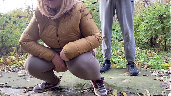 Download Video - Depraved curvy MILF in leggings squats down and pisses next to me