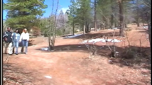 The long haired brunette, Taryn Thomas, looks hot as she lays on her couch, wearing...