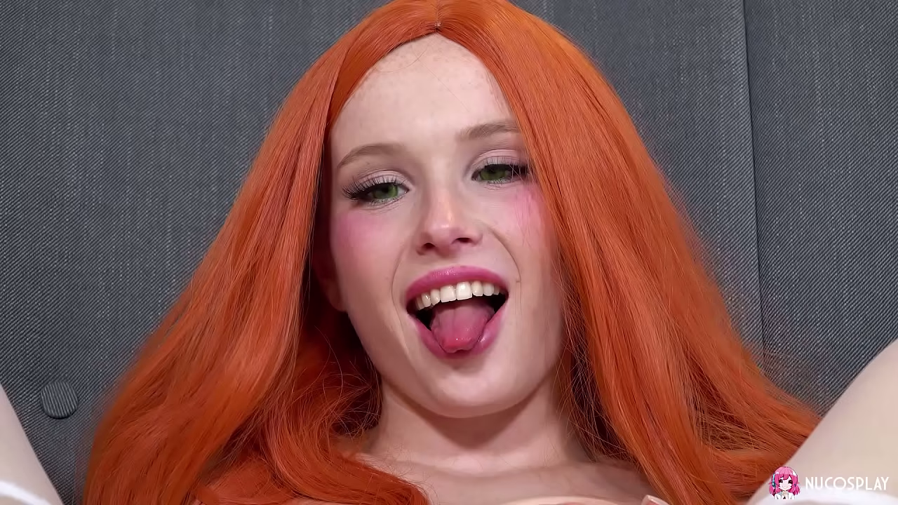 Horny slutty redhead Arielka fingers her shaved pussy and enjoys it with a sex toy.