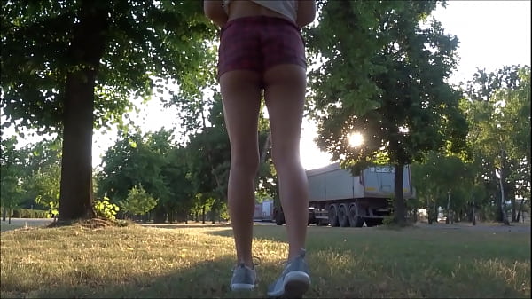 Isabel peeing in the parking lot, truckers watching her