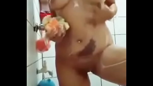 thumb striptease whil e taking a bath