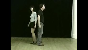 Karate woman ballbusting man