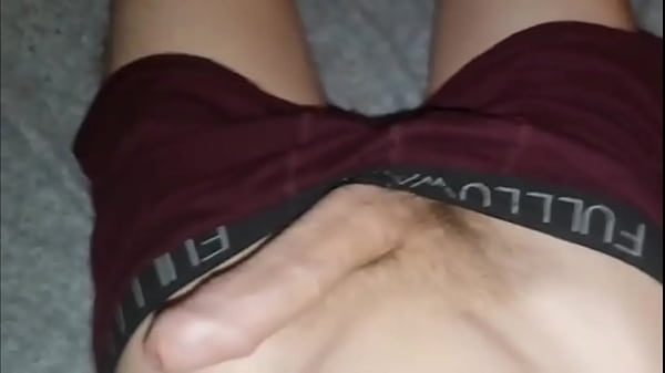 The guy jerks off and cum pours from the penis