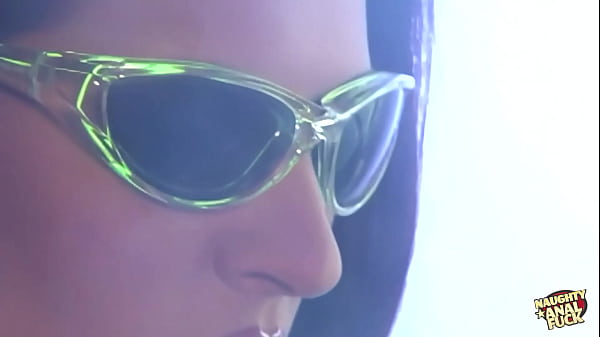 Wearing futuristic glasses allows the busty babe to watch the brunette have her booty drilled