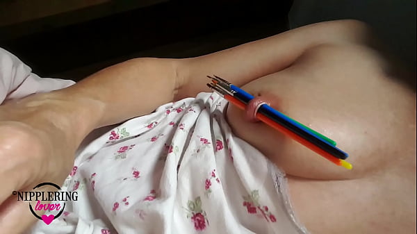 nippleringlover horny inserting multiple sticks in extreme stretched nipple piercing