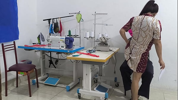intense seduction in the sewing workshop