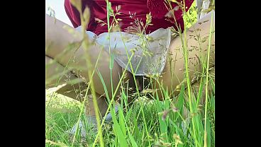 pissing outside near grape tree