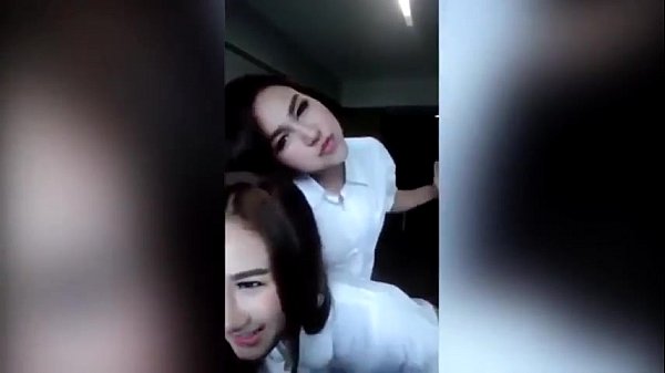 Sexy dance of two women with a body shape