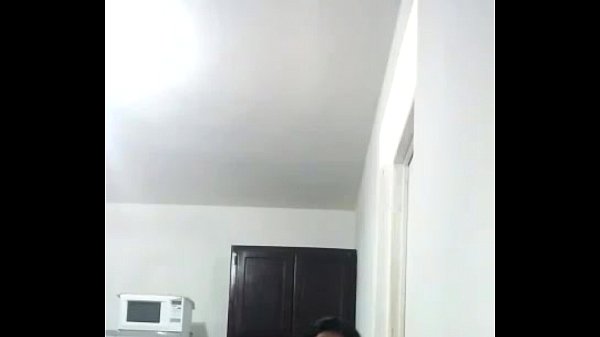 Brunette films herself in the kitchen Moja la Tasa