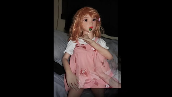 Camille Sex Doll models in pink outfit
