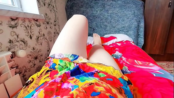 Lovely sissy lying sideways with playful hair t...