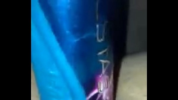 Horny white girl masturbates with can