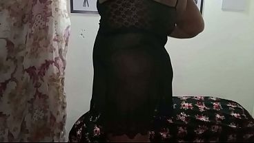 Christian housewife in a transparent nightgown without panties