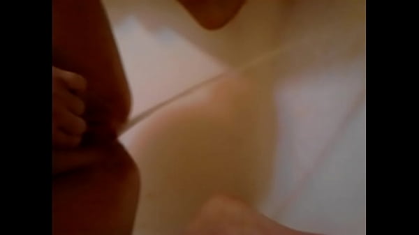 Girl takes long pee in shower