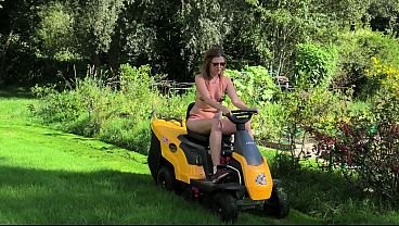 In a bikini on a mower!