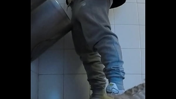 Download Video - Amateur boys in sneakers wank and try handjob in public toilets' urinal